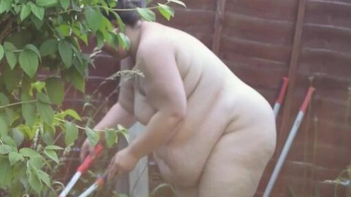 Naked in garden