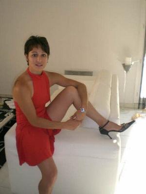 MILF slut strips off her red dress