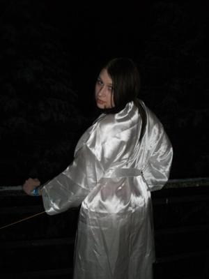 Sexy brunette posing in satin robe