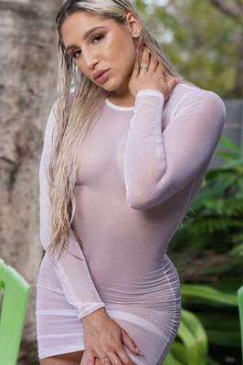 Abella Danger - Outside wearing a see through sheer dress