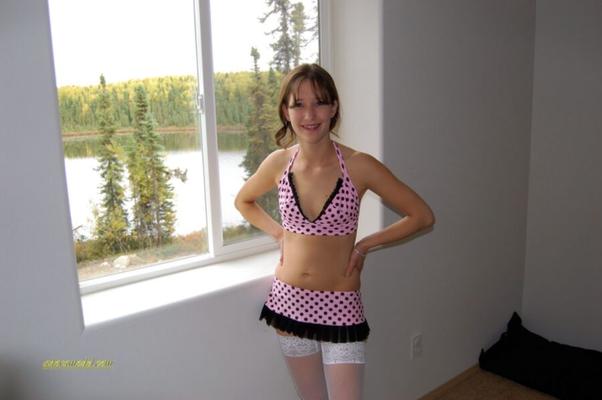 amateur adora teases in pink and black polka dots lingerie