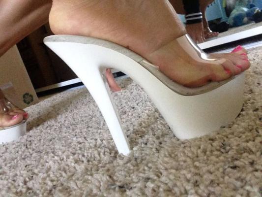 Amateur Girl Showing her Stripper Heels Collection