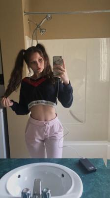 Teen teasing in pigtails