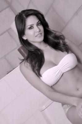 Sunny Leone touching herself on the toilet