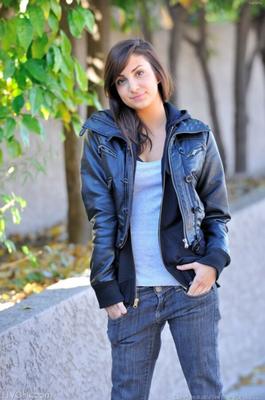 Brunette beauty in leather jacket