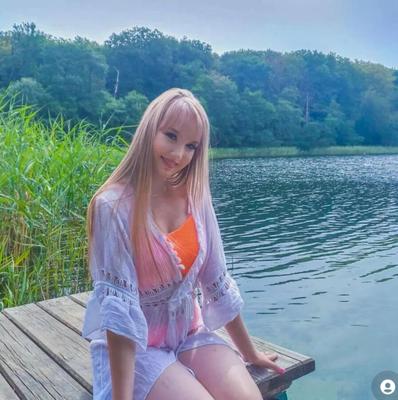 Sexy blonde Julia by the lake