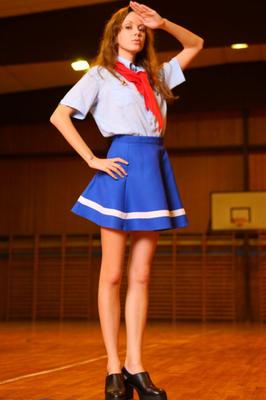 Skinny redhead Natasha in pioneer uniform solo