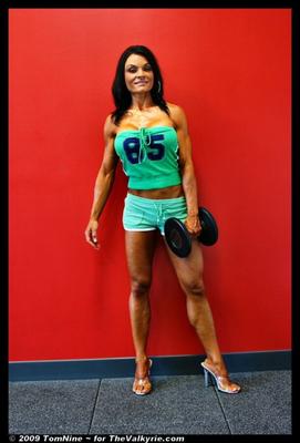 Angela Kirkland Green shirt and shorts workout