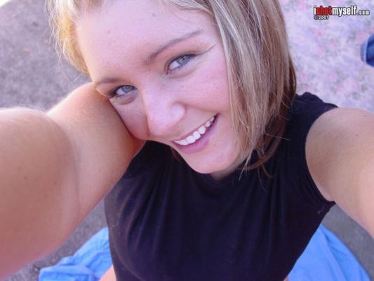 busty blonde amateur takes a bunch of self shots