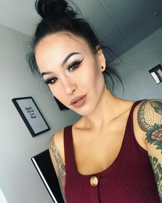 Sexy tattooed babe