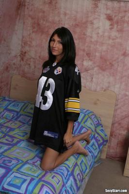 Starr: cute babe; ugly football jersey