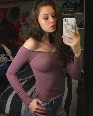 Teen posing for you in thin purple top