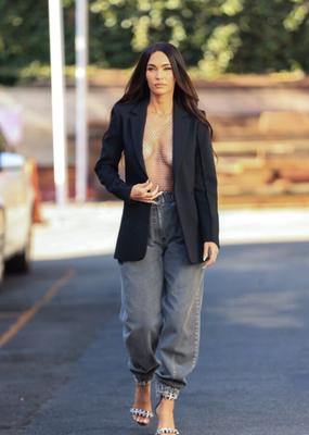 Megan Fox wears barely anyting to cover he tits